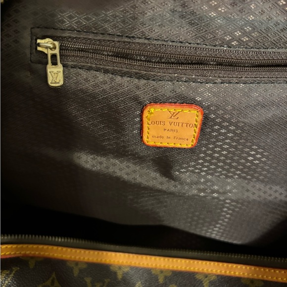 Authentic LV travel bag no strap, brown in color in good condition. - Picture 1 of 7